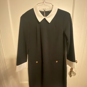 Chic Black and White Dress with Gold Accents